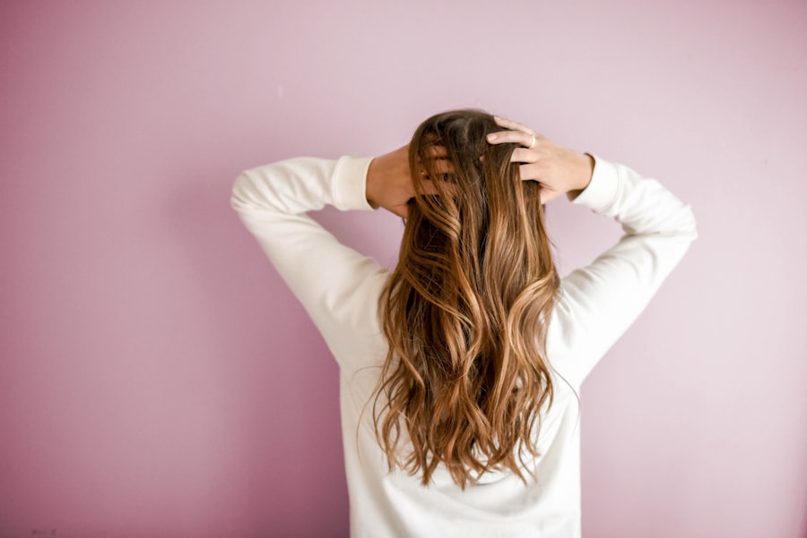 Client showing off healthy, styled hair
